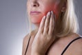 Aged woman with toothache, teeth pain closeup