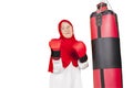 Aged woman wearing boxing gloves in studio Royalty Free Stock Photo