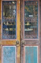 Aged wooden door with grid Royalty Free Stock Photo