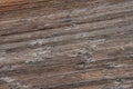 Aged worn timber boards on a pier - background texture