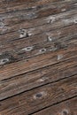 Aged worn timber boards on a pier - background texture