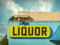 Aged and worn vintage liquor store sign Royalty Free Stock Photo