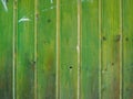 Detail of a green wooden wall