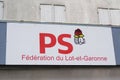 PS logo brand and text sign red rose in hand French Socialist Party on wall facade office