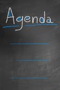 Agenda chalk text and lines on blackboard or chalkboard