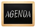 Agenda - chalkboard with text on white background