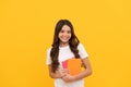 agenda. happy child hold notebook. teen girl with notepad. kid planning her work. Royalty Free Stock Photo