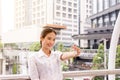 Agent asian woman showing house keys and smilling Royalty Free Stock Photo