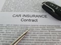 Agent letting client sign car insurance document Royalty Free Stock Photo