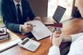 Agents are using pens pointing to contracts and are being explained to customers at the office Royalty Free Stock Photo