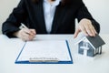 Agents working in real estate investment and home insurance signing contracts in accordance with the home buying insurance Royalty Free Stock Photo