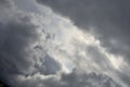 Agglomerations of clouds torn by the rays of the sun Royalty Free Stock Photo