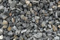 Aggregate / gravel consisting of larger dark and light gray coarse stones, crushed and broken at a stone pit Royalty Free Stock Photo