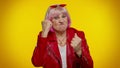 Aggressive angry senior granny woman trying to fight at camera, shaking fist, boxing, punishment Royalty Free Stock Photo