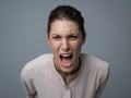 Aggressive woman yelling at camera Royalty Free Stock Photo