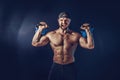 Aggressive bearded muscular bodybuilder doing Exercise for the s Royalty Free Stock Photo