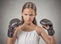 Aggressive child teenager girl wearing boxing gloves Royalty Free Stock Photo