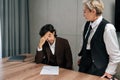 Aggressive female boss reprimands incompetent male employee for bad work result, decreasing financial stats in report Royalty Free Stock Photo