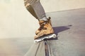 Aggressive inline rollerblader grinding on ramp in skatepark Royalty Free Stock Photo