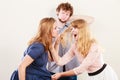 Aggressive mad women fighting over man. Royalty Free Stock Photo