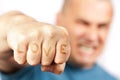 Aggressive man with words LOVE on his knuckles