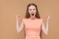 Aggressive screaming woman looking at camera. Royalty Free Stock Photo