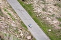 Aghnjadzor, Armenia - May 10, 2017. Convertible car going on asphalt road in Armenian mountain