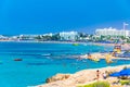 AGIA NAPA, CYPRUS, AUGUST 15, 2017: People are enjoying a sunny day at a beach at Agia Napa, Cyprus Royalty Free Stock Photo