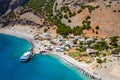 AGIA ROUMELI, CRETE, GREECE - JULY 20 2021: Aerial view of the village of Agia Roumeli at the exit of the Samaria Gorge on the