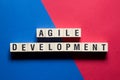 Agile Development word concept on cubes Royalty Free Stock Photo