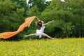 Agile woman leaping in the air Royalty Free Stock Photo