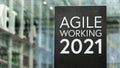 Agile Working 2021 sign in front of a modern office building