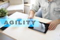 Agility text on virtual screen. Business technology and internet concept. Royalty Free Stock Photo