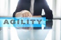 Agility text on virtual screen. Business technology and internet concept. Royalty Free Stock Photo