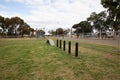 Agility weave poles and ramp at dog park Royalty Free Stock Photo