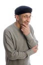 Aging artist thinking with beret hat