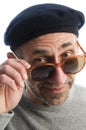 Aging artist thinking distorted nose beret hat