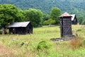 Aging Farm With Octagon Shaped Wooden Silo