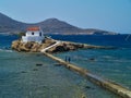 Agios Isidoros chapel on a rock in the sea.