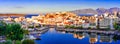 Agios Nikolaos, Crete, Greece: Sunset view of Agios Nikolaos over Voulismeni Lake, a picturesque town in the eastern part of the