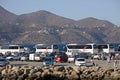 Holiday tour buses with a backdrop of mountains