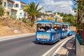AGIOS NIKOLAOS, GREECE - AUGUST 2, 2012: Tour train carries tour