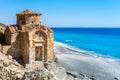 Agios Pavlos beach with Saint Paul church, a very old Byzantine church that was built at the place Selouda, Greece. Royalty Free Stock Photo