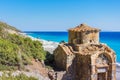 Agios Pavlos beach with Saint Paul church, a very old Byzantine church that was built at the place Selouda, Greece. Royalty Free Stock Photo