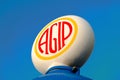 Agip old petrol company logo with flat blue background