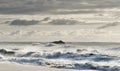 Agitated sea at autumnal sunset