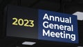 Overhead sign with words - annual general meeting 3d illustration