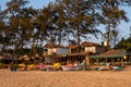 Agonda Beach, Goa/India- February 22 2020: Caucasian Tourists and families relaxing and enjoying on the beach at Agonda Beach