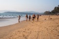 Agonda Beach, Goa/India- February 22 2020: Caucasian Tourists and families relaxing and enjoying on the beach at Agonda Beach