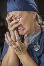 Agonizing Crying Female Doctor or Nurse Royalty Free Stock Photo